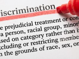 Discrimination highlighted with red marker on a document, concerning the Discriminaton in European school