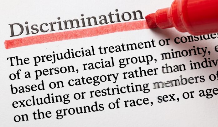 Discrimination highlighted with red marker on a document, concerning the Discriminaton in European school